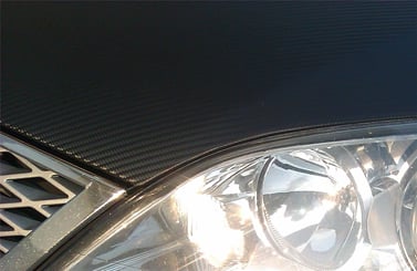 Polep vozů, motorek instalace 3D folií - detail zakončení kapoty Mondeo.